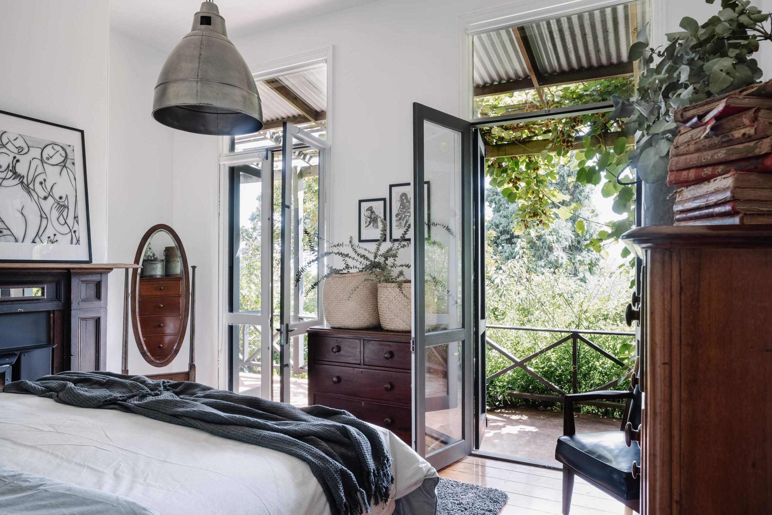 a verandah off the bedroom in the Lewellyn lake house in Daylesford