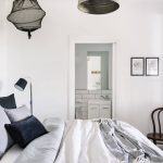 A bedroom in the Lewellyn lake house in Daylesford